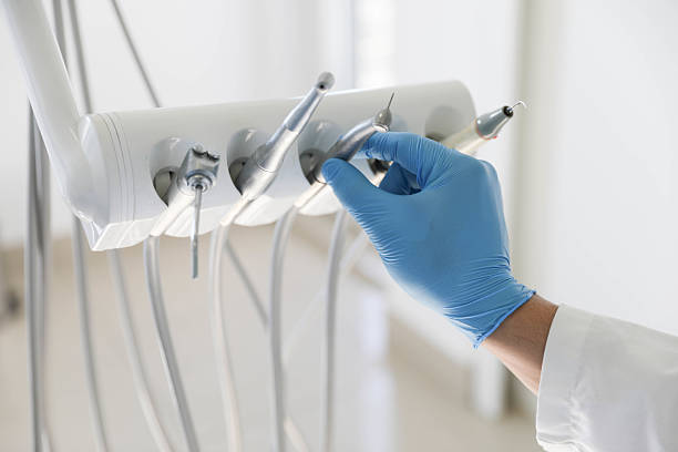 Professional Emergency Dentist technician working in Columbus, NC